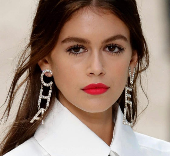 Chanel Logo Earrings –